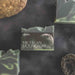 Bar of soap labeled 'Michigan Moonglow' with a dark background