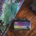 Bar of soap with 'Northern Lights' packaging on a wooden surface